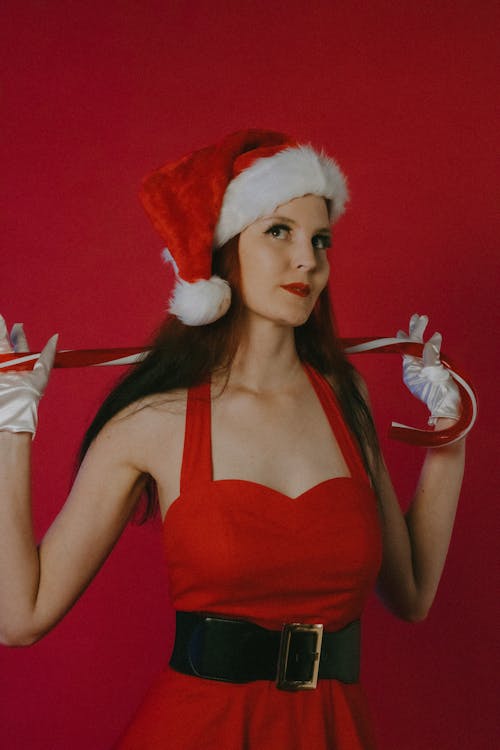 Beautiful Brunette Wearing Santa Hat