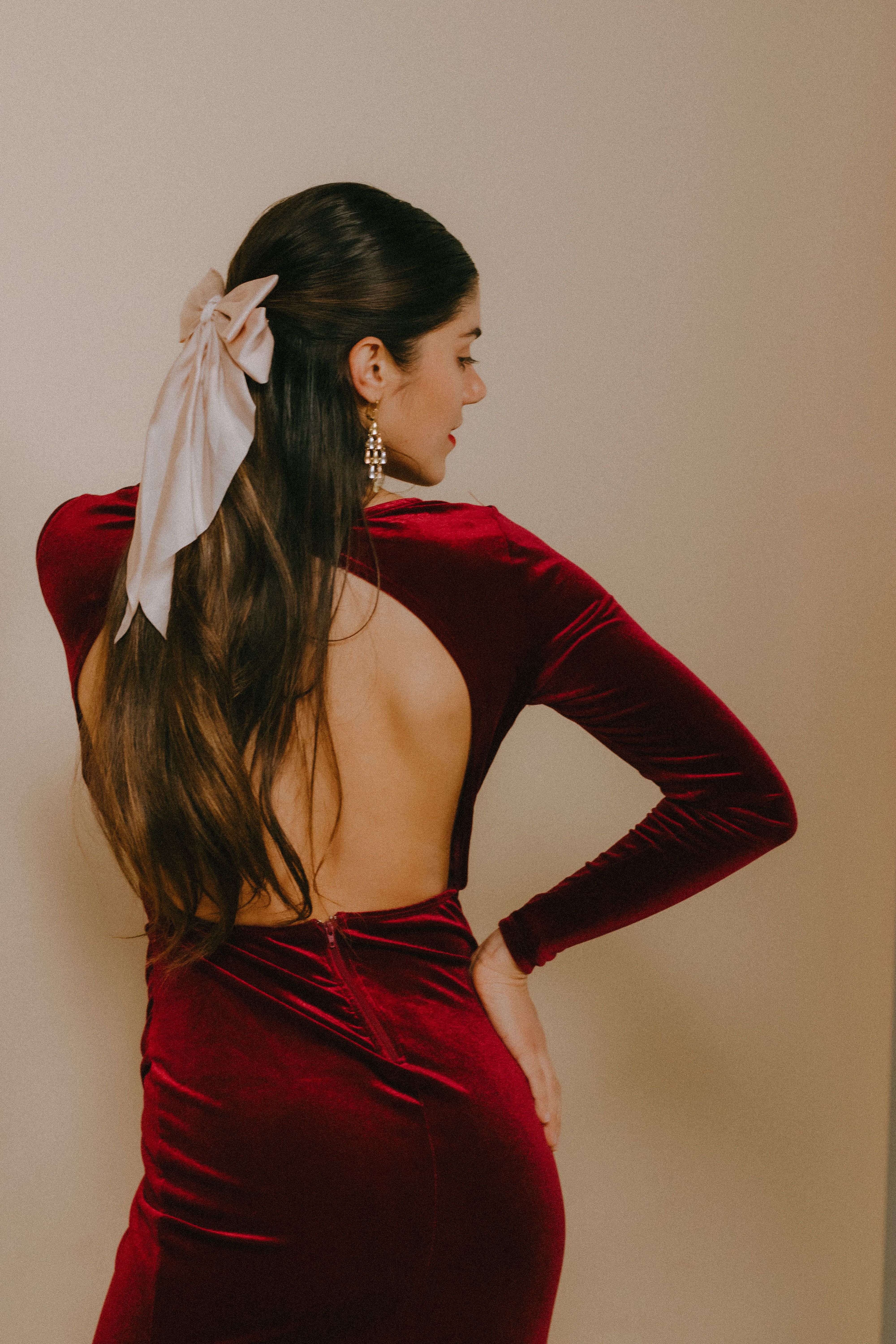 Woman Posing in Burgundy Dress  Free Stock Photo