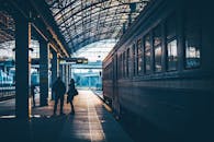 People Standing Beside a Train