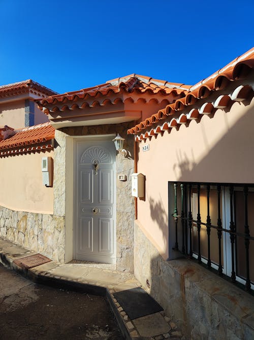 White Door in Wall of Mediterranean City