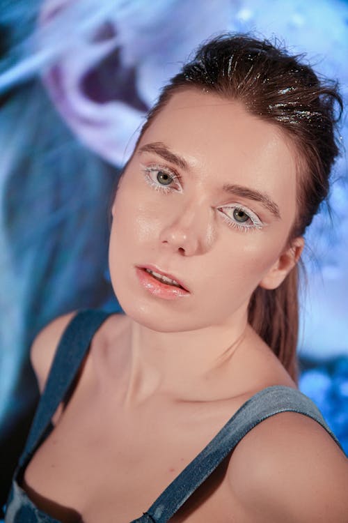 Portrait of a Young Woman Wearing White Mascara 