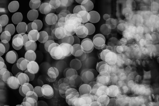 Black and white bokeh lights creating an abstract and elegant background.