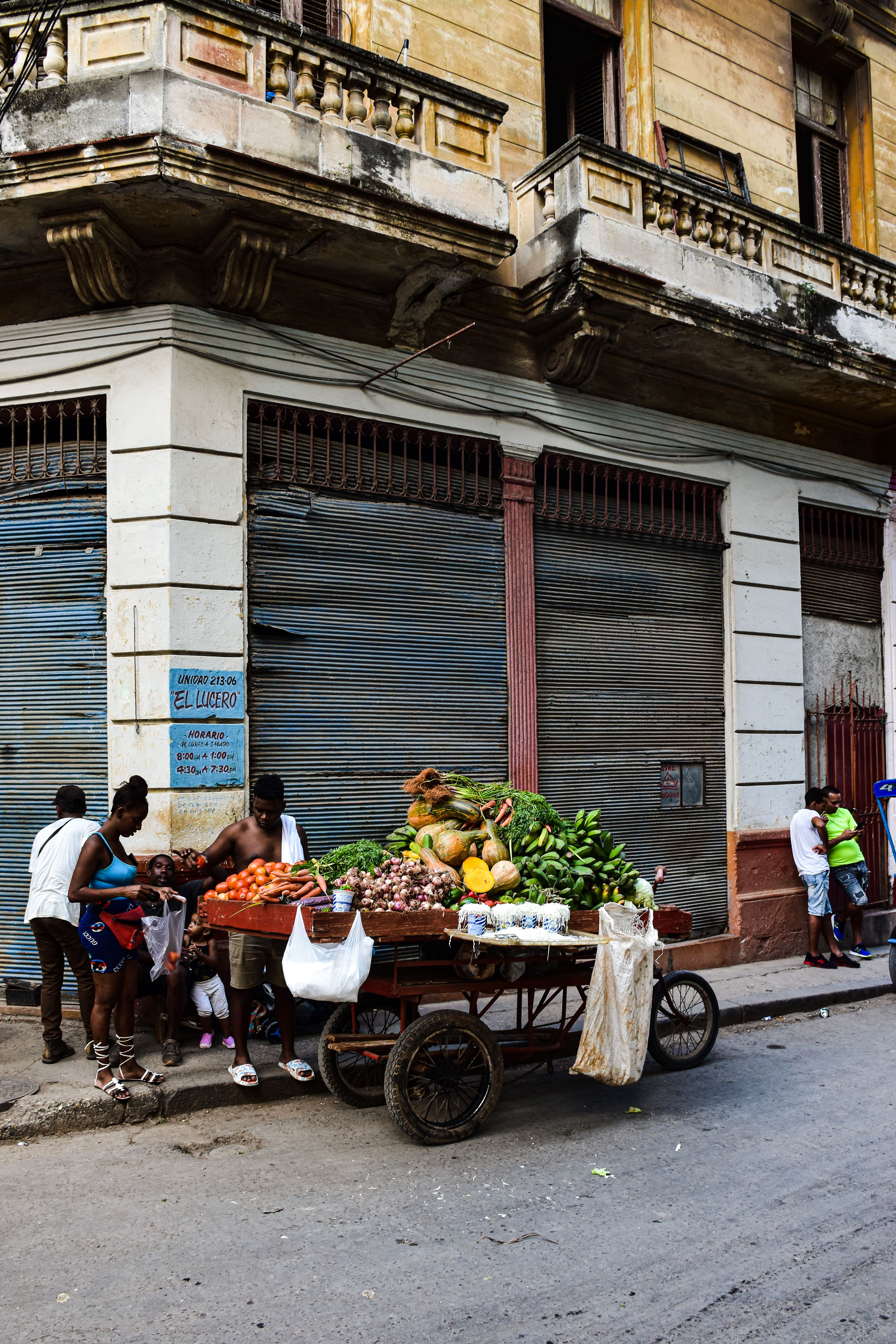 Merchant with Cart Filled with Merchandise · Free Stock Photo