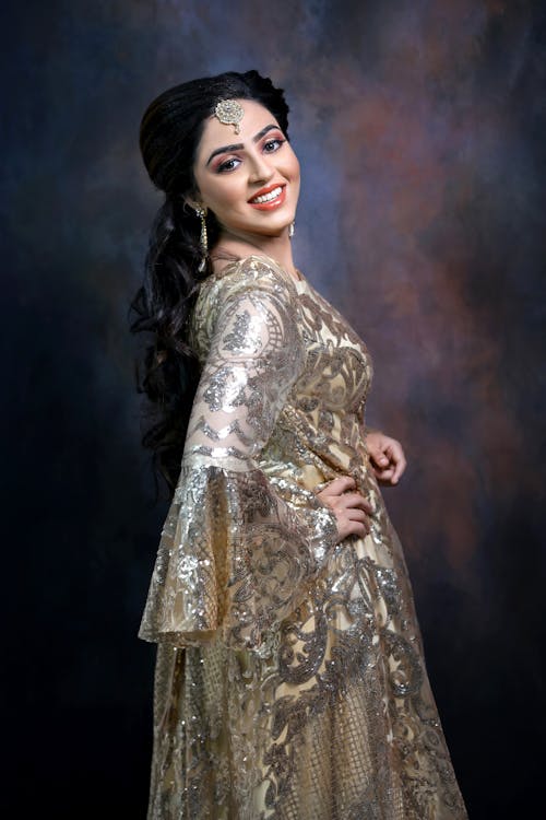 Young Brunette Posing in Elegant Traditional Dress