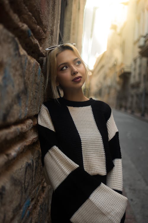 Woman Leaning on Wall 