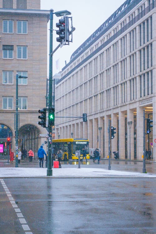 People Walking on Street in City Downtown