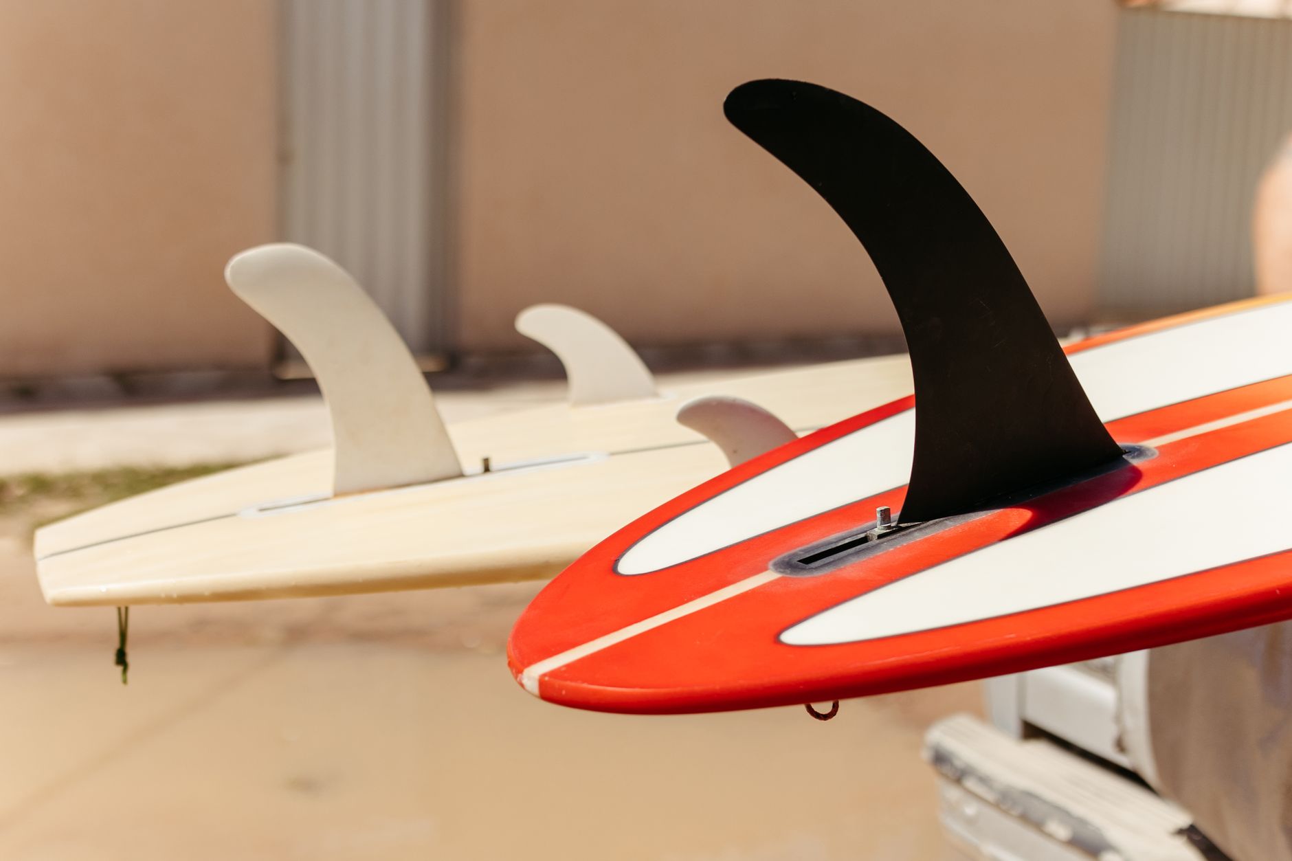 Vibrant surfboards captured outdoors, embody summer vibes and adventure.