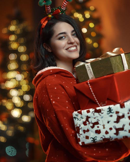 Portrait of Woman with Christmas Gifts