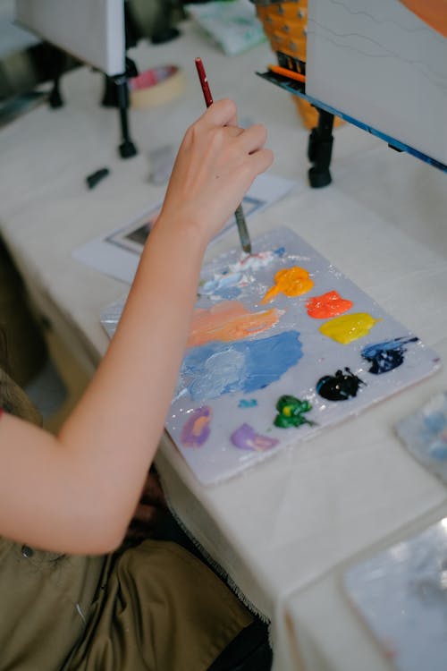 Close up of Hand Painting on Table