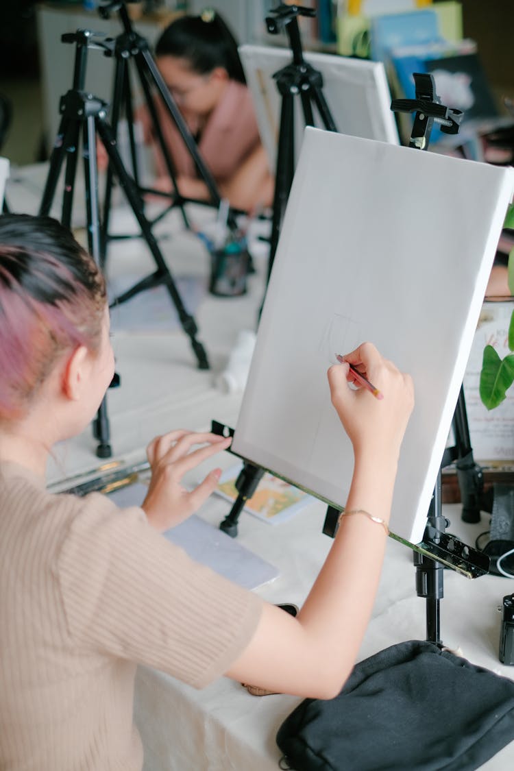 Girl Drawing With Pencil