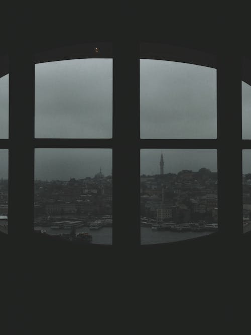 Istanbul Sea Coast behind Room Windows in Darkness