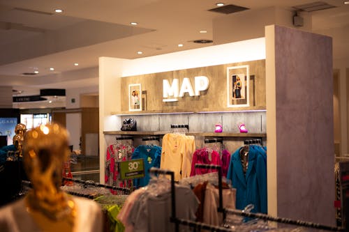 A clothing store with a sign that says map