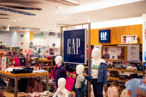 Gap store with mannequins and clothing on display