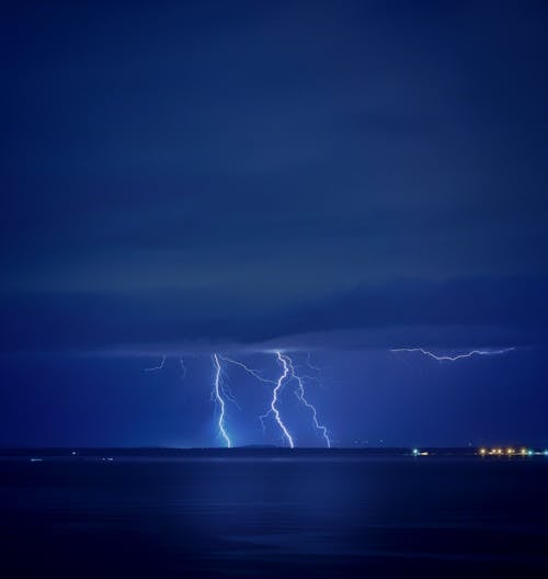 Thunderstorm over Sea Coast at Night