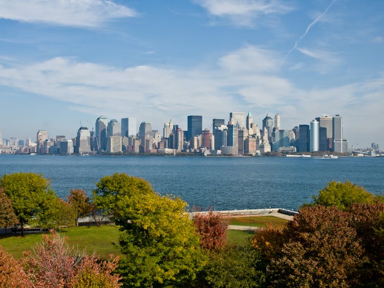 Park On Sea Shore And Manhattan Skyscrapers Behind