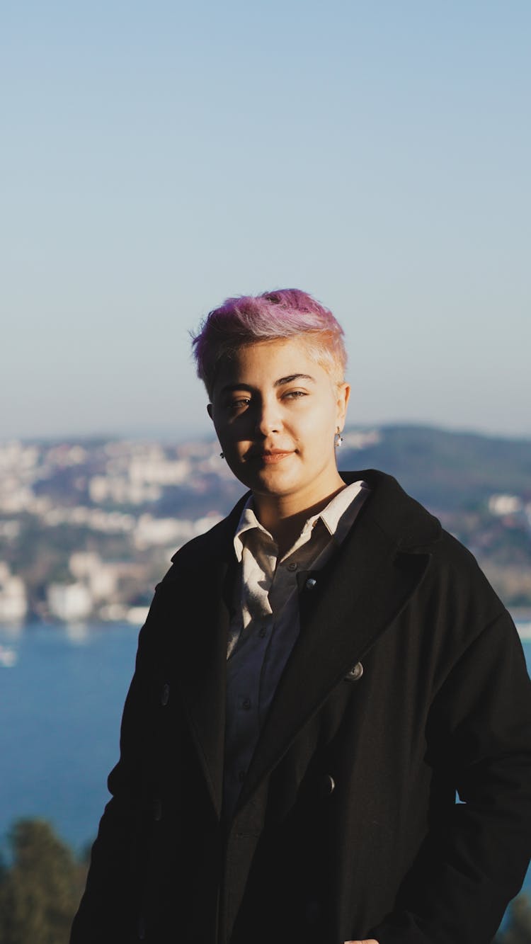 Woman With Short Pink Hair Posing Near Sea