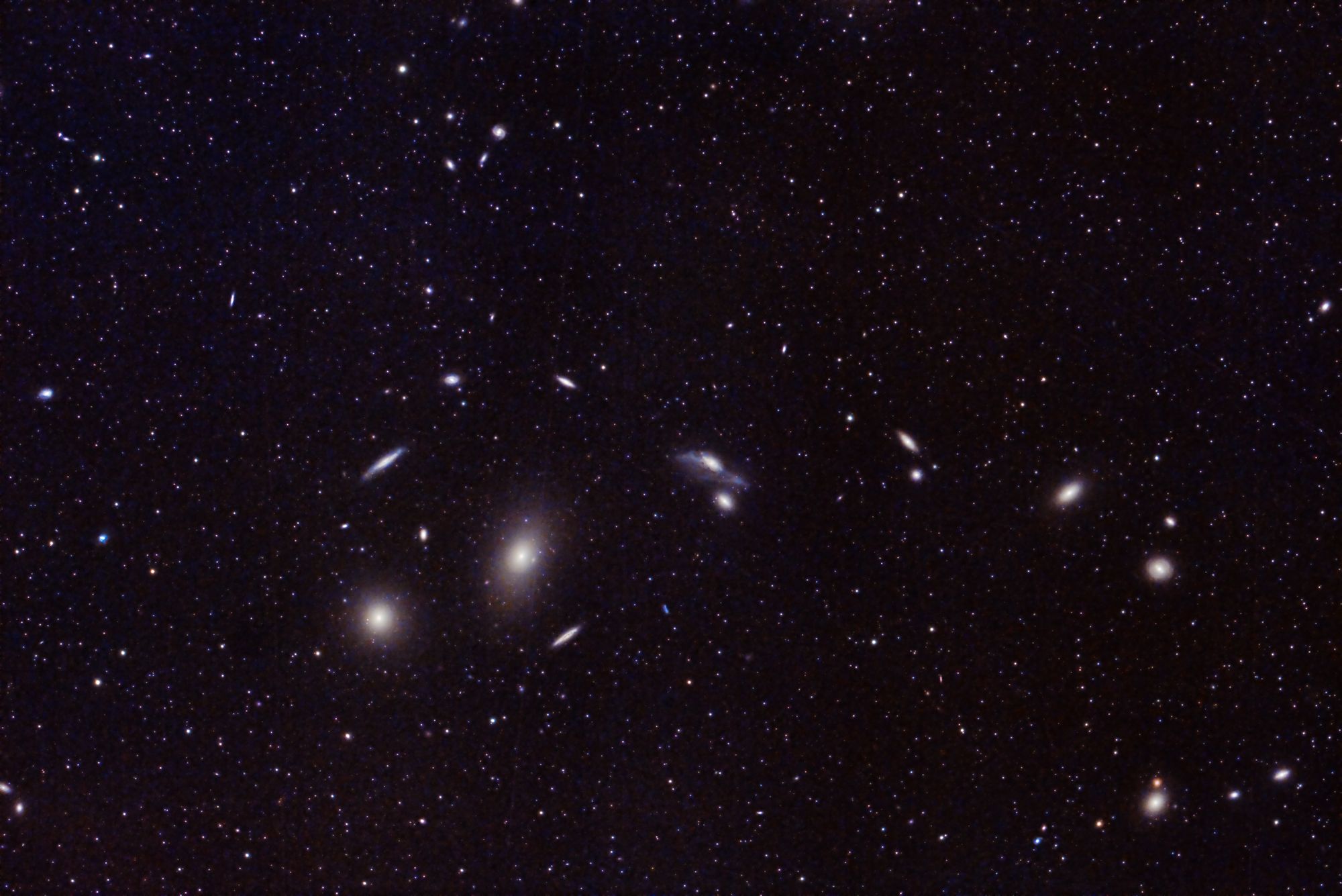 Captivating image of distant galaxies and star clusters in the vast universe. Perfect for astronomy enthusiasts.