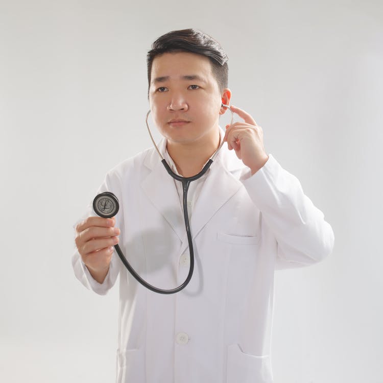 Young Doctor Holding A Stethoscope 