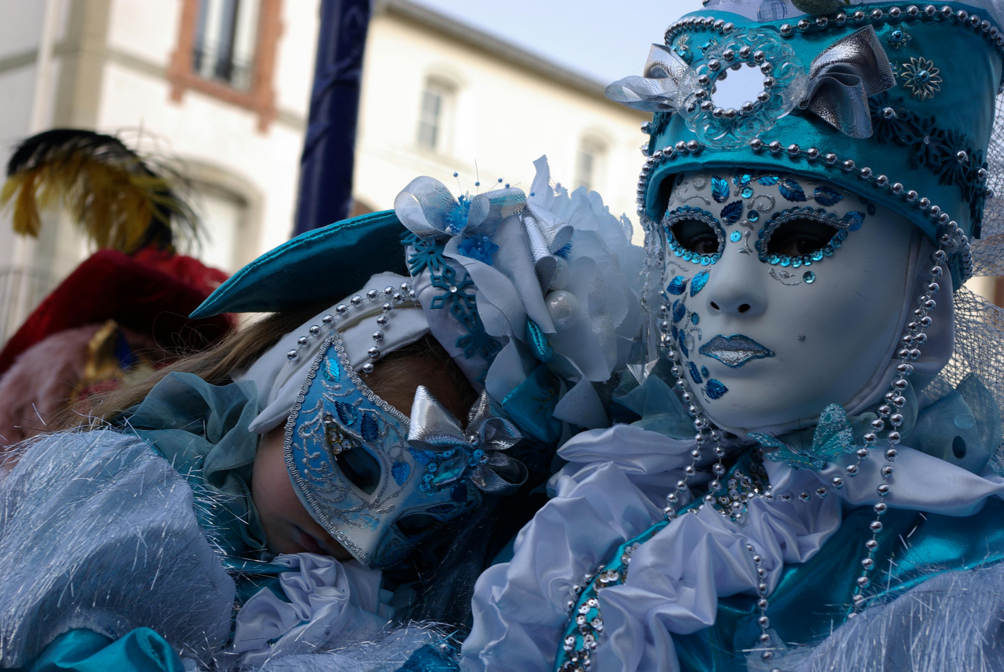 People with Traditional Venetian Carnival Masks · Free Stock Photo