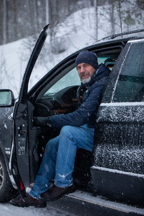 Man Looking Out of His Car