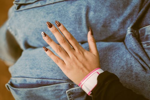 Hand with Painted Nails in Overhead View