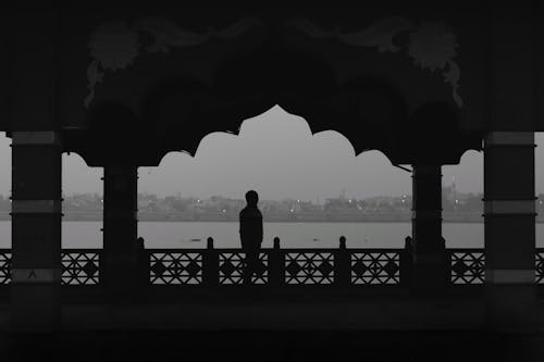 Silhouette of Person on Passage in City