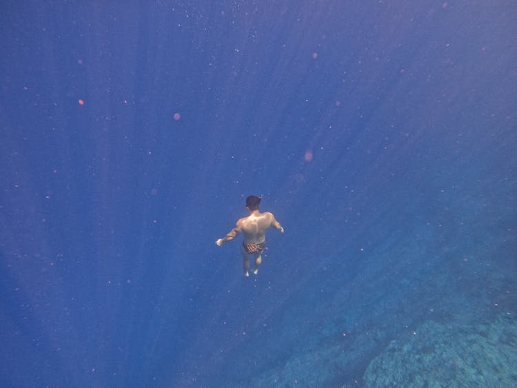 Man Diving Underwater