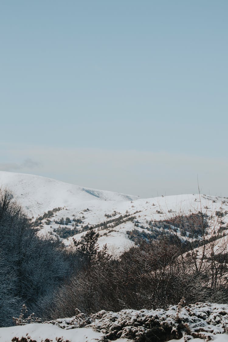 Snow Covered Mountains During Winter