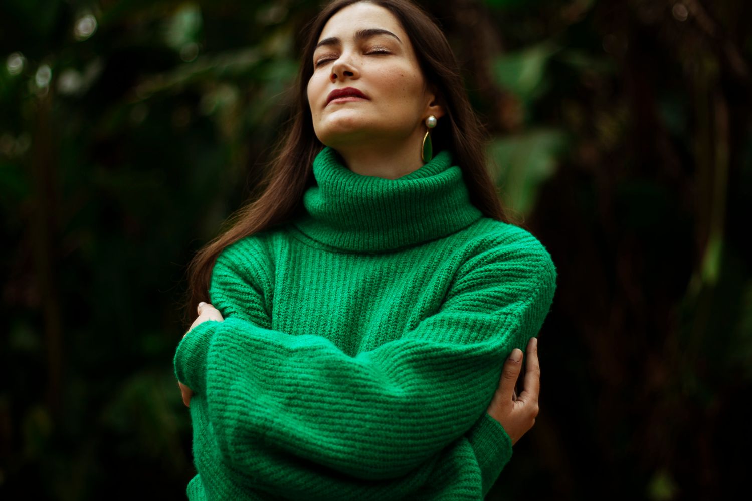 Forest green cropped sweater with high rise straight leg jeans