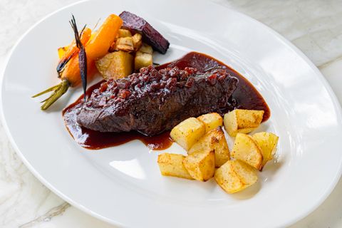 Braised Short Ribs With Roasted Roots. Photo by Nicu Cobasnean on Pexels