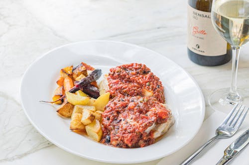 Free Dish and Wine Served in a Restaurant  Stock Photo