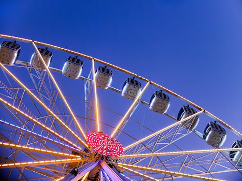 Low Angle Shot of an Illuminated Ferris Wheel 