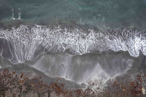 Sea Waves Stroking Sandy Beach