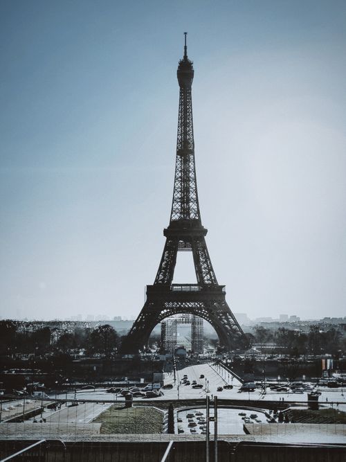 Free Majestic view of the Eiffel Tower against a winter sky in Paris, capturing urban scenery and architecture. Stock Photo