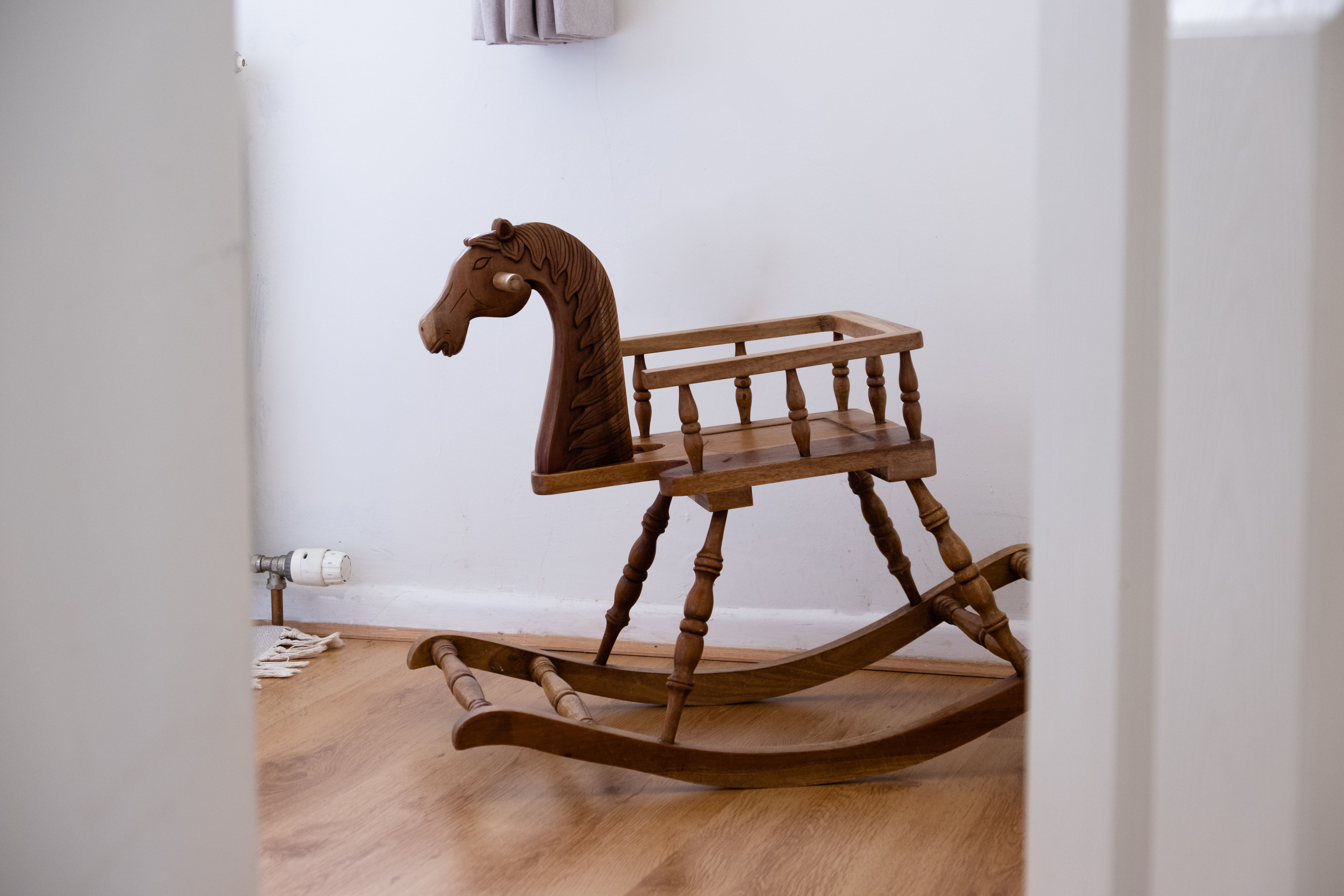 handcrafted solid wood furniture in a sunlit room - non toxic home decor