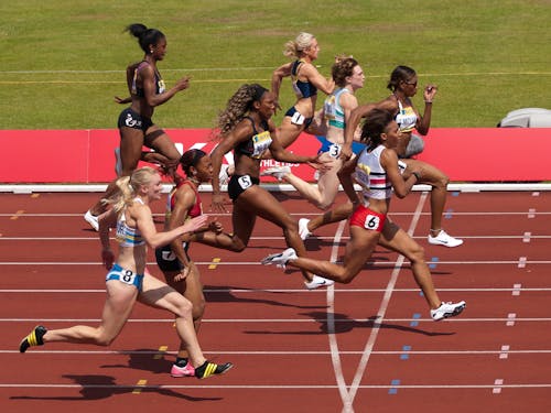 Women Running on Track
