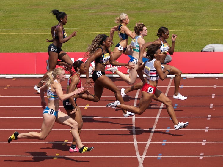 Women Running On Track