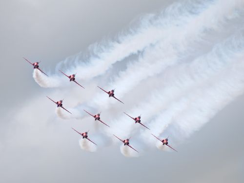 Free Thrilling display of precision flying by a squadron of jet aircraft at Cosford air show. Stock Photo