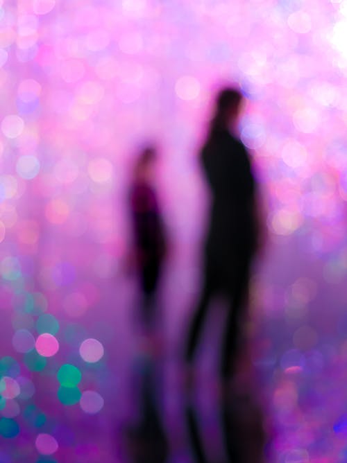 Blurred People on Pink Background