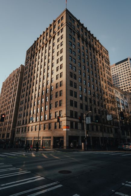 A striking high-rise building in Seattle's downtown cityscape captured during dusk.