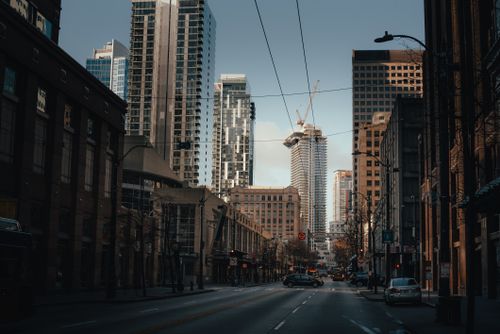 Free Urban skyline with towering skyscrapers and bustling streets at twilight in Seattle. Stock Photo