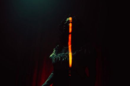 Stage light in a dark room, photo by Wolrider Yurtseven on Pexels