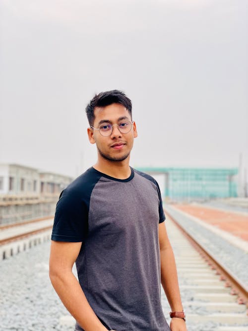 Man in Round Eyeglasses and T-shirt