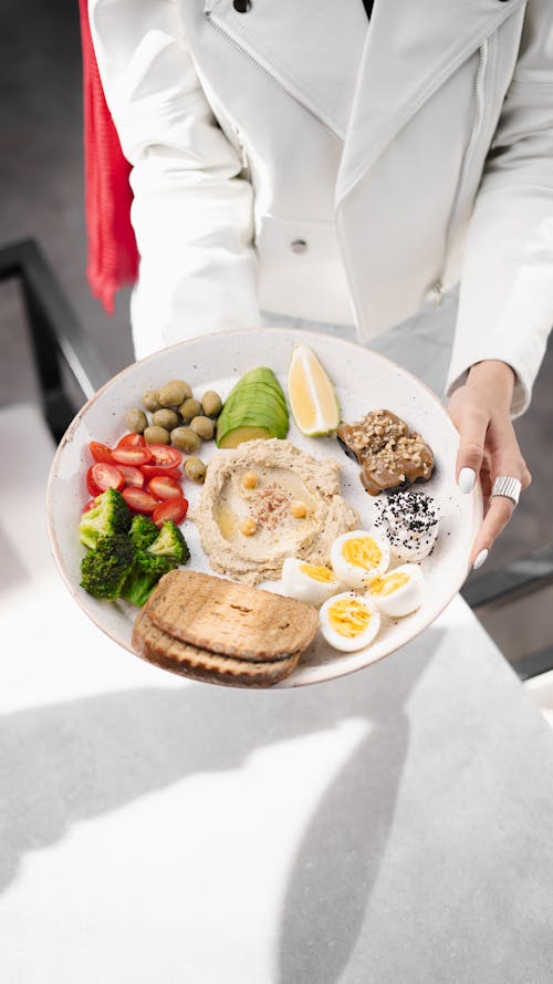 Eggs, Hummus and Vegetables on Plate 