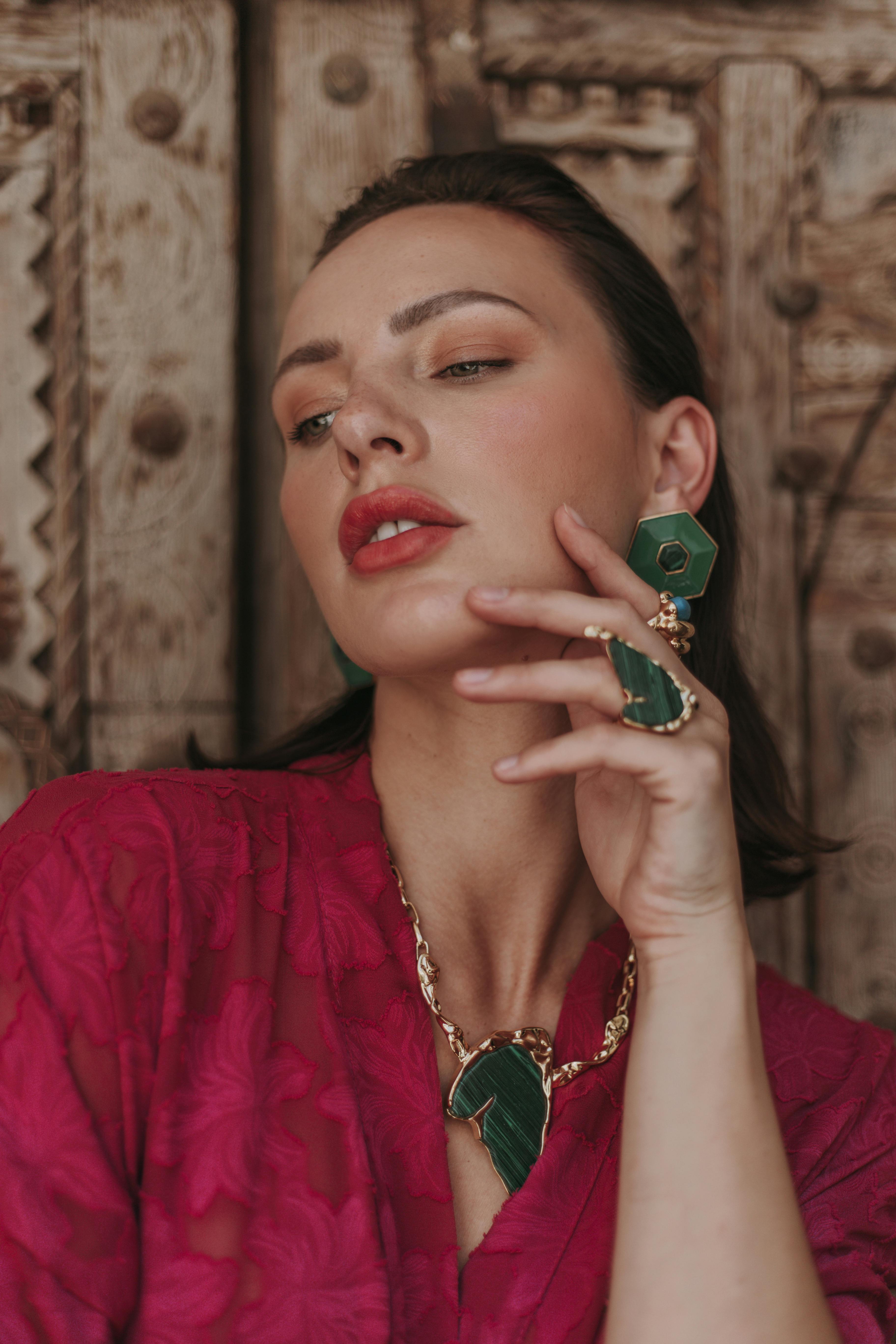 model with jade jewelry set in gold