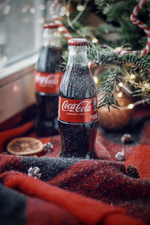 Безкоштовне стокове фото на тему «Coca-Cola, вертикальні постріл, Вибірковий фокус»