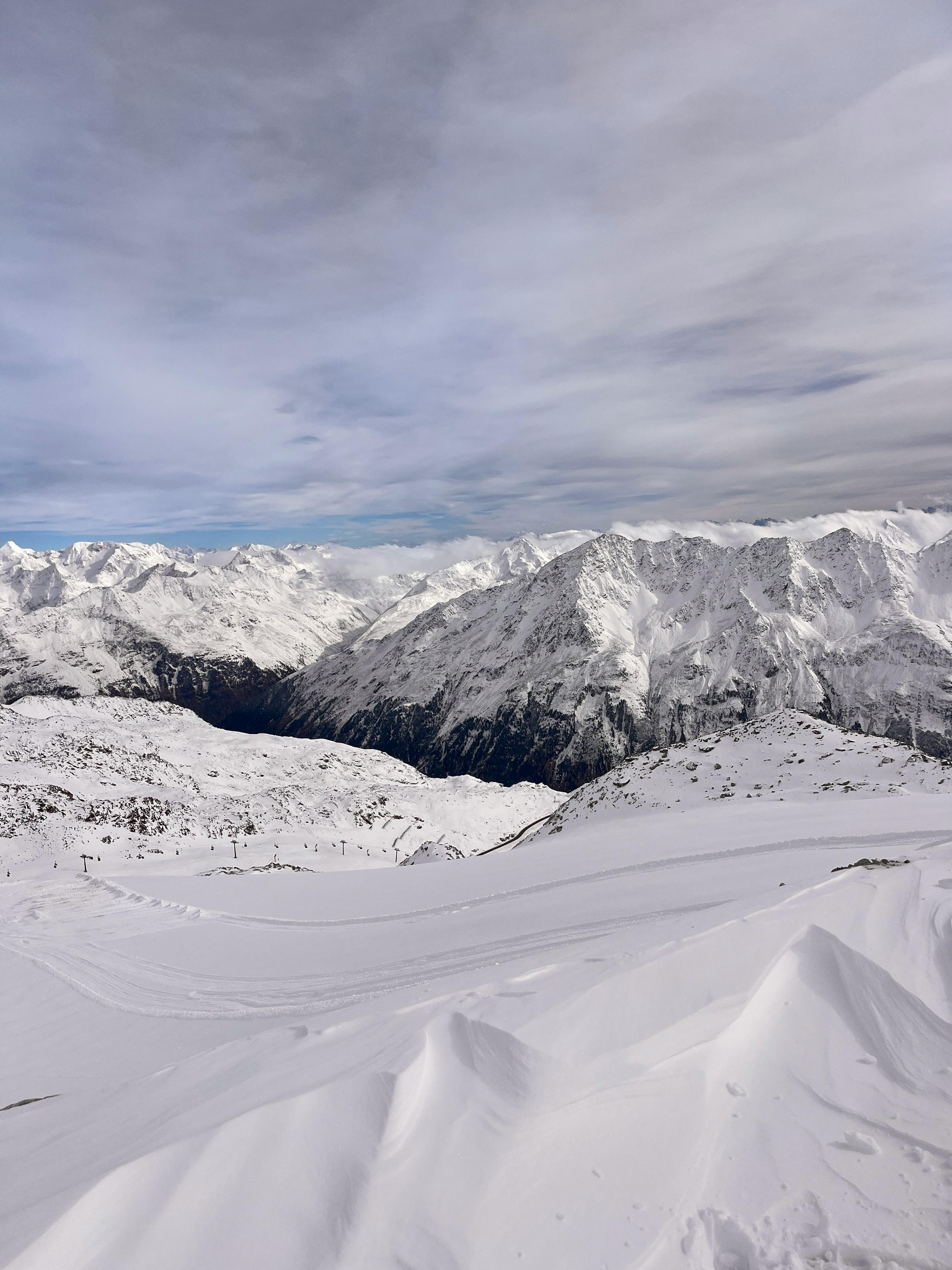 Breathtaking view of snow-covered mountains in the Alps during winter.