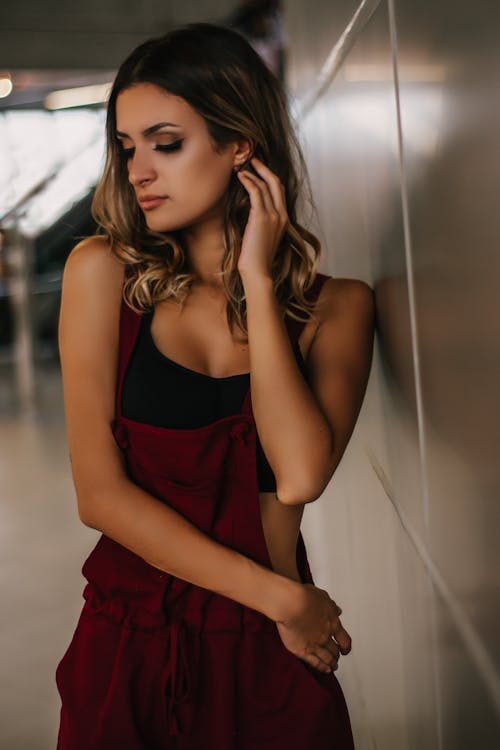 Photo of Woman Leaning On Wall