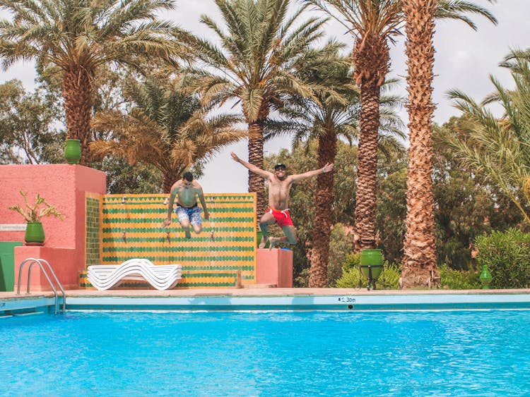 Man Jumping On Pool