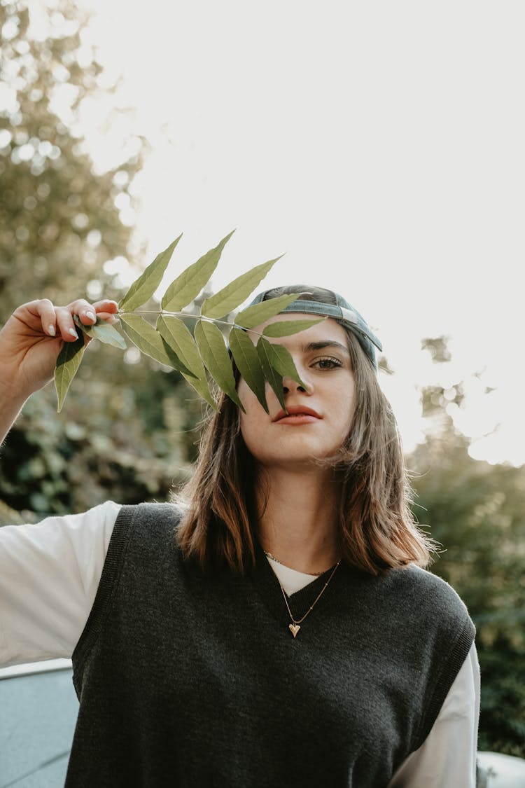 Girl Holding A Leaf 